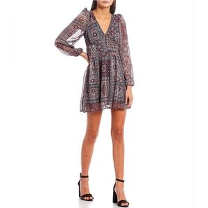 New Honey  and Rosie  Dress Fit and Flare size Small V neck  long sleeve.